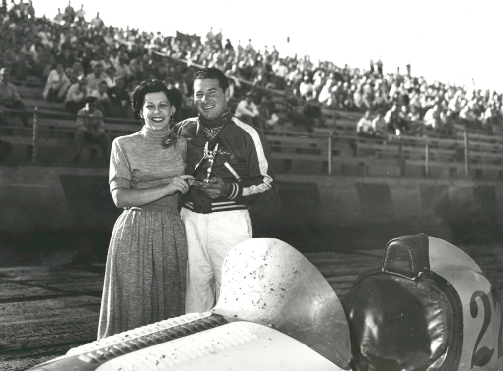 Rodger Ward and trophy girls at Gilmore Stadium
